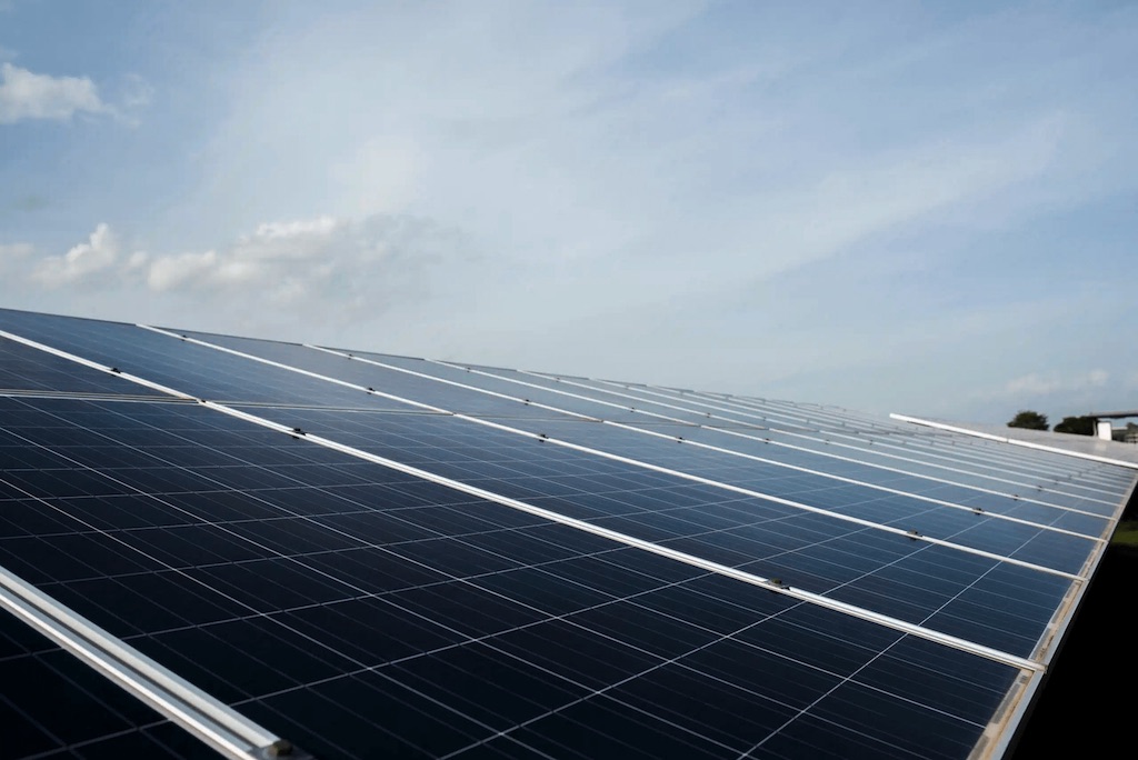 Solar panels installed in open field